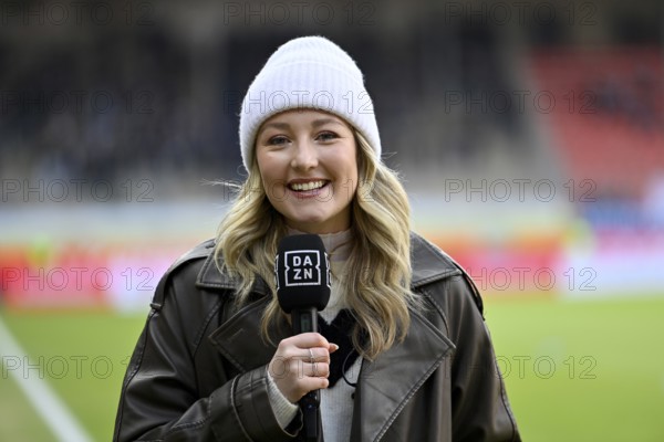 DAZN presenter reporter Lisa Teller's portrait in an interview microphone Mikro Logo soccer Bundesliga, Voith-Arena, Heidenheim, Baden-Württemberg, Germany