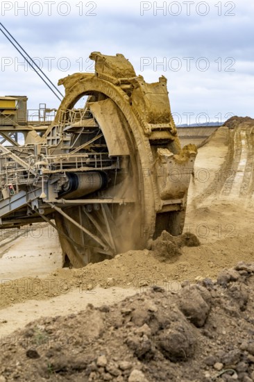 Opencast lignite mine Garzweiler 2, bucket wheel excavator 261 excavating the surface, at the rest of the hamlet Lützerath, bucket diameter is 17 metres, Erkelenz, North Rhine-Westphalia, Germany