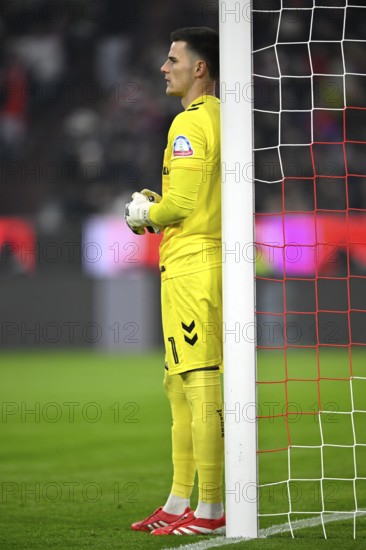 Goalkeeper Michael Zetterer SV Werder Bremen SVW (01) leans against goalpostsAllianz Arena, Munich, Bavaria, Germany