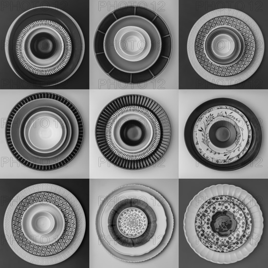 Monochrome plates and bowls with diverse geometric patterns form a striking arrangement in a grid. Each setting showcases intricate design and texture