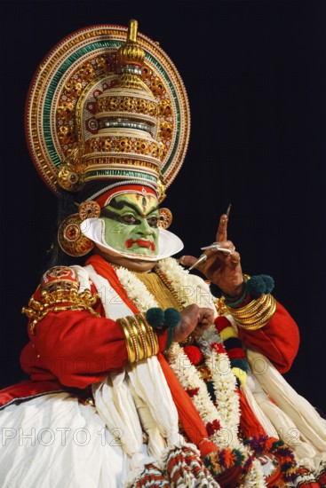CHENNAI, INDIA, SEPTEMBER 8: Indian traditional dance drama Kathakali preformance on September 8, 2009 in Chennai, India. Performer plays Arjuna (pacha) character