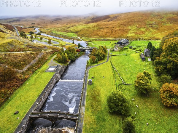 Autumn colors over Claerwen Dam, Claerwen Valley, Elan Valley Reservoir, Rhayader, Powys, Wales, UK