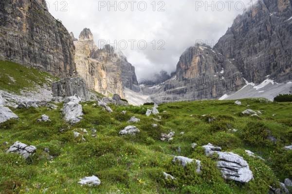 Cliffs and pinnacles in fog, Brenta Mountains, Brenta-Adamello Natural Park, Trentino, Italy