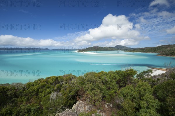 Sunny daytime view from Hill Inlet lookout over Whitehaven Beach, Whitsunday Island, Queensland, Australia