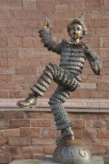 Sculpture of the Mainzer Klepper-Garde, jester with ruff on ball with inscription MKG, carnival club, dancing, cheerful, arms, above, carnival, carnival museum, provisions magazine, old town, Mainz, Rhine-Hesse region, Rhineland-Palatinate, Germany