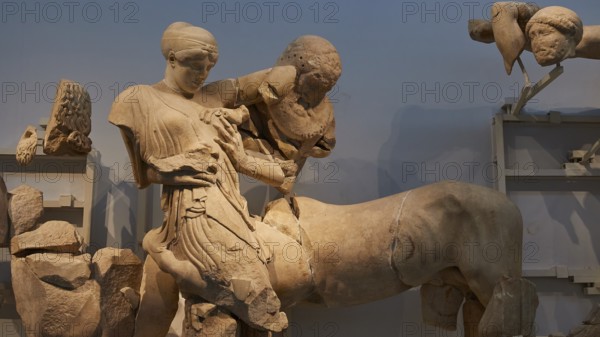 Group with Eurytion and Deidameia, West Gable of the Temple of Zeus, Battle between Lapiths and Centaurs, Mythological Scene with a Centaur in an Ancient Greek Marble Sculpture, Olympia Archaeological Museum, Ancient Olympia, Olympia, Peloponnese, Greece