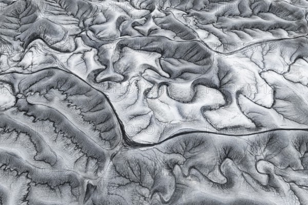 Stunning aerial shot capturing the intricate, textured patterns of erosion at Moonscape Overlook in Utah, showcasing nature's artistry from above