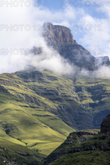 Mountains with fog at the amphitheatre, Drakensberg National Park, KwaZulu Natal, South Africa