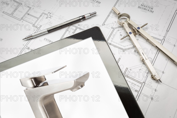 Computer Tablet Showing Custom Faucet On House Plans, Pencil, Compass
