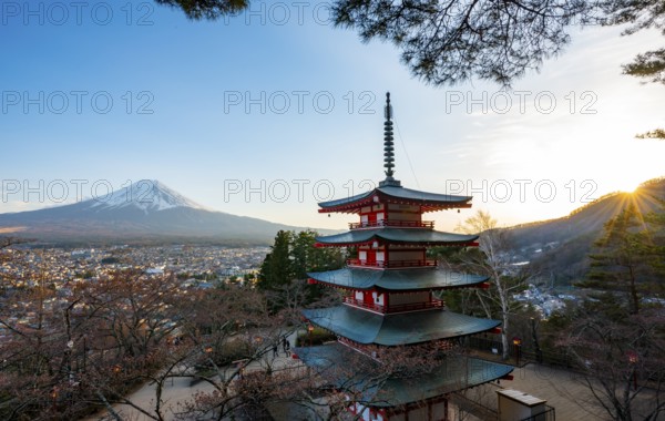 Five-story pagoda of a Shinto Shrine, Chureito Pagoda, with sunset view of Fujiyoshida City and Mount Fuji volcano, Arakura Fuji Sengen Shrine, Arakurayama Sengen Park, Yamanashi Prefecture, Japan
