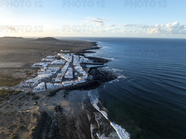 Caleta de Famara seaside location, aerial view, Lanzarote, Canary Islands, Spain