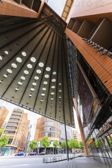 Tall, modern buildings with glass facades and geometric shapes that offer a broad urban perspective, Berlin, Germany