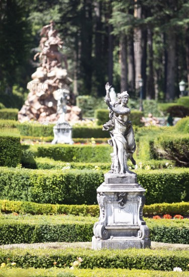 Statue in the garden of the Palacio La Granja de San Ildefonso or Summer Palace, province of Segovia, Castile and Leon, Spain