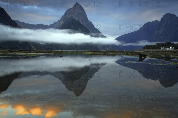 Milford Sound at sunrise, reflection in the lake, South Island, New Zealand, Milford Sound, South Island, New Zealand
