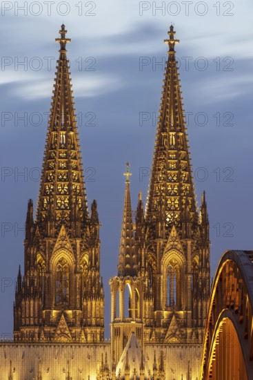Cologne Cathedral and the Hohenzollern Bridge illuminated with LED lights, Cologne, North Rhine-Westphalia, Germany