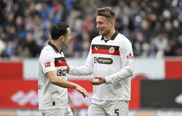 Maniolis Saliakas FC St. Pauli (02) in dialogue Discussion with Hauke Wahl FC St. Pauli (05) Bundesliga, PreZero Arena, Sinsheim, Baden-Württemberg, Germany