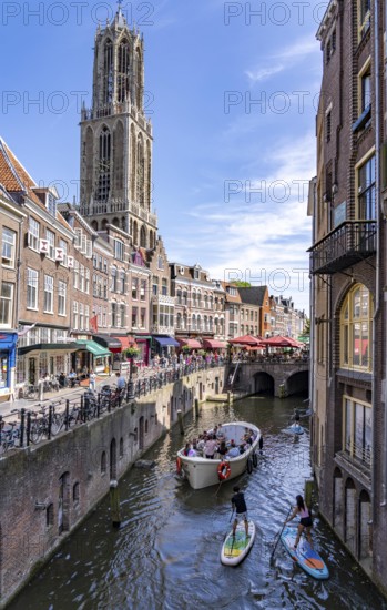 The old town centre of Utrecht, Oudegracht, around 2 km long with many old houses, cathedral tower, highest church tower in the Netherlands, newly renovated, shops, restaurants directly on the canal, many bridges, boat traffic of all kinds, canal tour, Netherlands