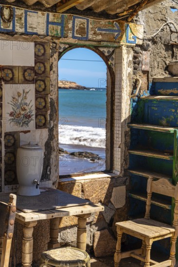 Interior of an old, charming, colorful, abandoned beach house with ocean view in ojos de garza village in gran canaria, spain