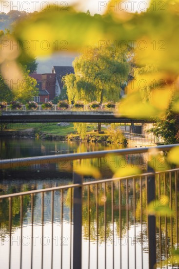 Bridge over Nagold in autumn, Calw, Black Forest, Germany