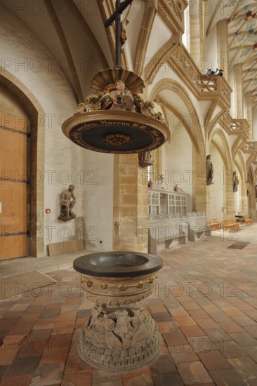 Interior view with baptismal font of the Romanesque Cathedral of St. Mary, Freiberg, Saxony, Germany