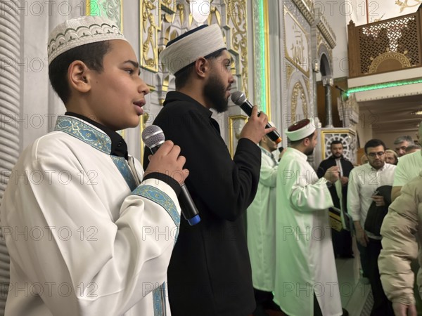 Dozens of Muslims stand in a long queue to view a sacred piece of the Kaaba curtain (Kiswa) while observing Laylat al-Qadr with prayers and supplications during the holy month of Ramadan in Gaziantep, Turkey on March 16, 2026, Gaziantep, Turkey