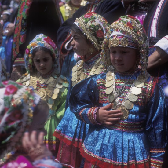 Kanakaries (girl) with gold jewellery, on Easter Tuesday (Lambri Tritti), Olymbos, Karpathos, Dodecanese, Greece