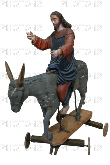 Christ on the palm donkey, on a white background, wooden figure from around 1400, Museum Bezau, Vorarlberg, Austria