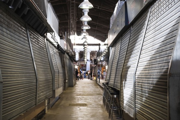 Closed market stalls in the Mercat de la Boqueria, famous market on the Ramblas in Barcelona, Spain