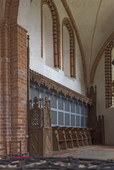 Gothic choir stalls in the interior of St Mary's Church, Brick Gothic, Klütz, Mecklenburg-Western Pomerania, Germany