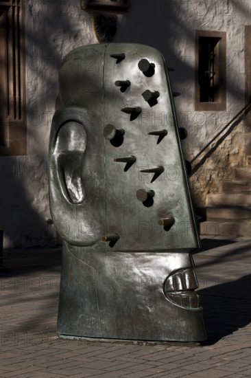 Bronze sculpture Goslarer Nagelkopf by Rainer Kriester at the town hall, Goslar, Lower Saxony, Germany