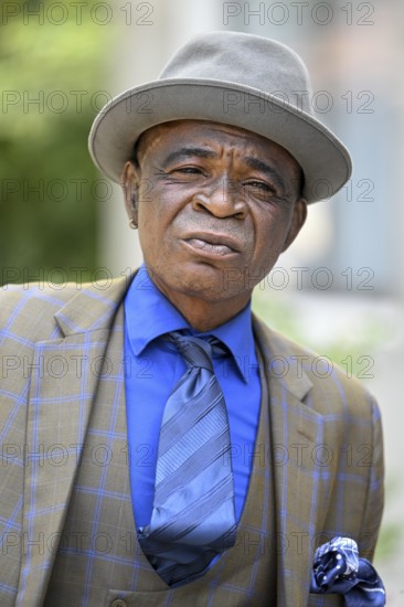 Sapeur, member of the Société des Ambianceurs et des Personnes élégantes (SAPE), society of entertainers and stylish people, Brazzaville, Republic of Congo