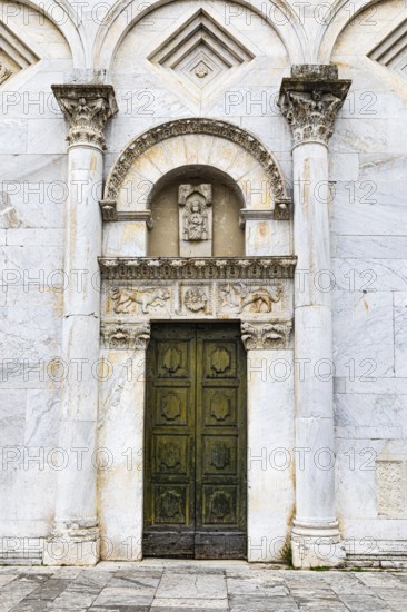 Entrance to the church of San Frediano, historic city centre, Lucca, Tuscany, Italy