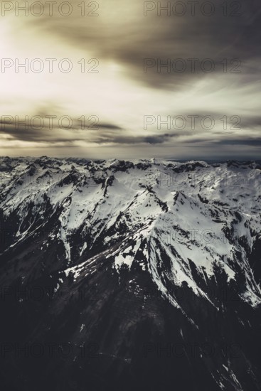 Flight over the late winter Lech Valley with a small aeroplane in Tyrol, Austria