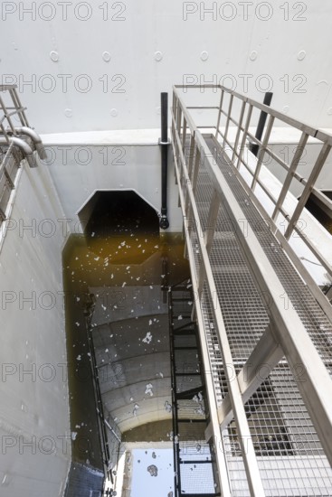 Oberhausen, Ruhr area, North Rhine-Westphalia, Germany - Emscher conversion, new Emscher AKE sewer, here the inlet channel from the Oberhausen pumping station, test run, the pumping station is being flooded on a trial basis, the pumps are also being tested, which will pump 16, 000 litres of wastewater per minute in future, the ecological conversion of the Emscher system consists of the construction of a central wastewater treatment system in the Ruhr area, the construction of sewers and the renaturation of the Emscher and its tributaries