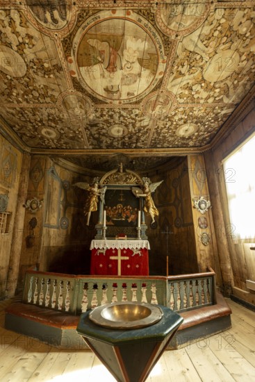 Interior with a view of the altar in Lom Stave Church (Lom stavkyrkje), Lom, Norway