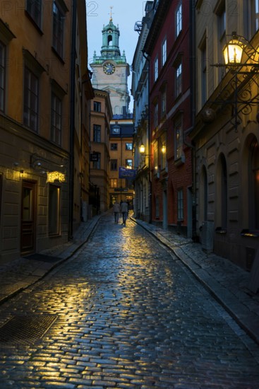 Houses in an alley of Gamla Stan, old town, centre, attraction, famous, city centre, city trip, tourism, travel, holiday, architecture, historic, UNESCO, world heritage site, evening, illuminated, evening shot, culture, history, city history, medieval, urban, Stockholm, Sweden, Scandinavia