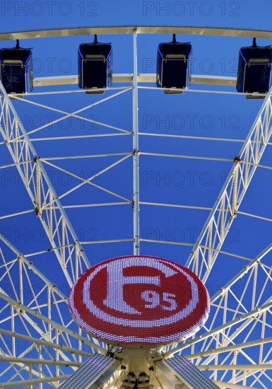 Logo in club colours of Fortuna Düsseldorf on the Ferris wheel, Burgplatz, Düsseldorf, North Rhine-Westphalia, Germany