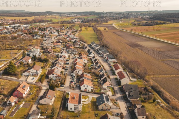 Aerial view of a residential development in a rural area with extensive fields, Ötisheim, Enzkreis, Germany