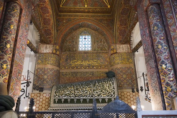 Magnificent interior with ornate ornaments and calligraphy in ancient architectural style, tomb of the famous Persian poet and Sufi mystic Jalal ad-Din Rumi, known as Mevlana, Mevlana Museum, Mevlana Museum, Mausoleum of Mevlânâ Jalal ad-Din Rumi, Konya, Central Anatolia, Turkey