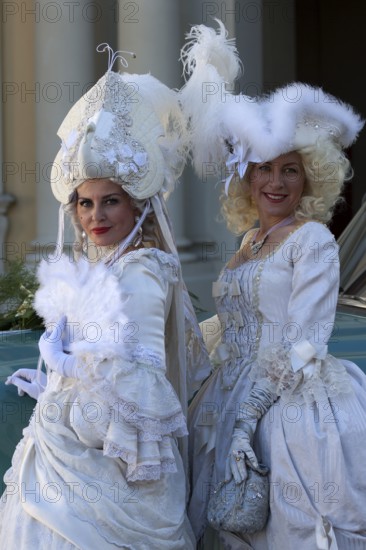 Costume wearers at the Venetian Fair, in the castle courtyard, Ludwigsburg, Baden-Württemberg, Germany