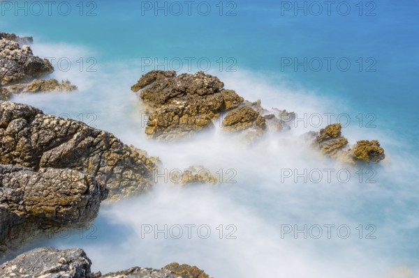 Romantic view over the sea in Koromacna Bay on a sunny day with rough seas on the island of Cres, long exposure, Croatia