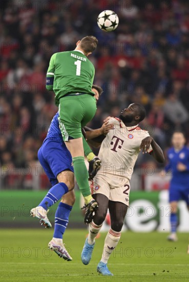 Goalkeeper Manuel Neuer FC Bayern Munich FCB (01) is injured in a duel with Bruno Petkovic GNK Dinamo Zagreb (09) and Dayot Upamecano FC Bayern Munich FCB (02) Champions League, Allianz Arena, Munich, Bavaria, Germany