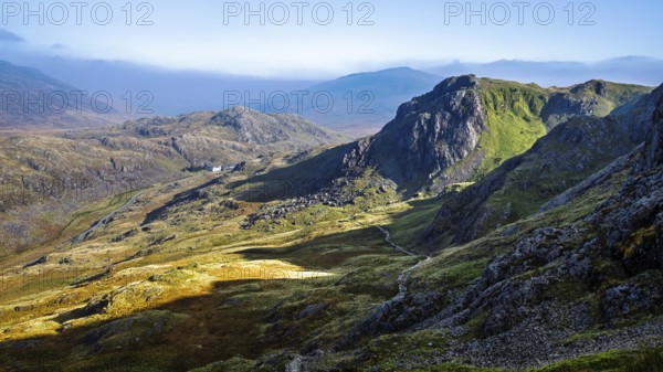 Autumn colours of Pen-y-Pass over Miner's Track, Start Point and road A4086, Snowdonia, Wales, UK