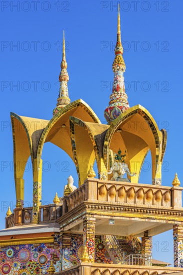 Round arch pavilions decorated with colorful mosaics and glass works of art, Buddhist temple complex Wat Phra That Sorn Kaew, Phetchabun province, Thailand