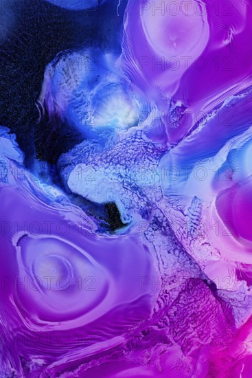 Vivid abstract liquids art featuring swirling patterns in shades of blue and purple, creating a galactic and dreamy visual experience. Ideal for creative backgrounds
