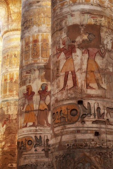 Ancient Egyptian Pharaonic Hieroglyphic relief details on columns of the Great Hypostyle Hall of the Temple of Karnak, Luxor, Egypt