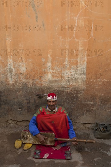 Traditional musician in the medina, man, music, street musician, street music, friendly, travel, holiday, city trip, african, orient, oriental, arab, artist, Marrakech, Morocco