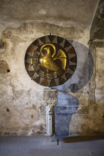 Johannesscheibe in the Romanesque crypt of Constance Cathedral is a round disc made of driven, fire-gilded copper sheet in the 13th century, which depicts the eagle as a symbol of the Evangelist Johannes, Constance, district of Constance, Baden-Württemberg, Germany
