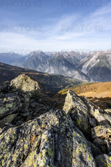 View from the ridge of the Venet to the mountain panorama of the Parzinn Group of the Lechtal Alps, yellow larches in autumn, Venet crossing, Ötztal Alps, Tyrol, Austria