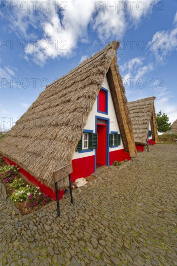 Typical traditional thatched houses Casinhas de Santana, landmark, UNESCO biosphere reserve, tourist event, Santana, Madeira, Portugal